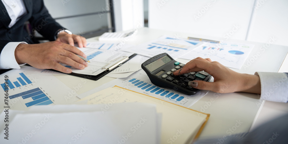 Business team analyzing income chart and graph in office. Close up. Business analysis and strategy concept