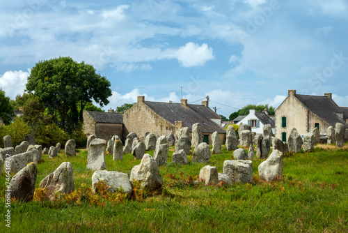 Standing stones (or menhirs) in the Menec alignment in Carnac, Morbihan, Brittany, France © Delphotostock