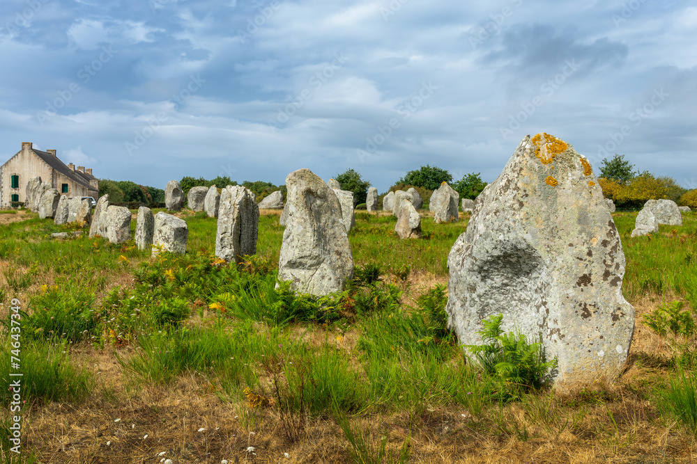 Standing stones (or menhirs) in the Menec alignment in Carnac, Morbihan, Brittany, France Standing stones (or menhirs) in the Menec alignment in Carnac, Morbihan, Brittany, France