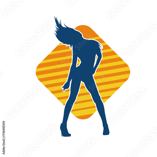 Silhouette of a slim female in dance pose. Silhouette of a woman dancing.