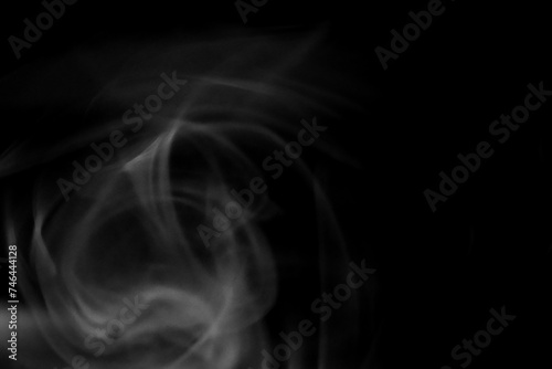 thick white smoke, plumes of smoke in the dark, smoke on a black background