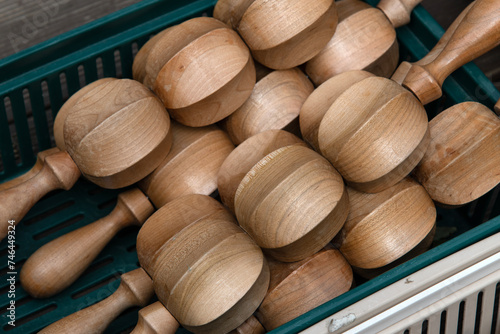 wooden massage equipments in the basket