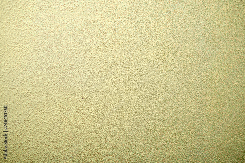 Texture of yellow stucco wall Texture of yellow stucco wall