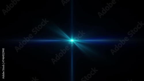 Wallpaper Mural Abstract loop center glow blue star optical shine light lens flares animation on black background for screen project overlay. 4K seamless loop dynamic kinetic bright star light rays effect.  Torontodigital.ca