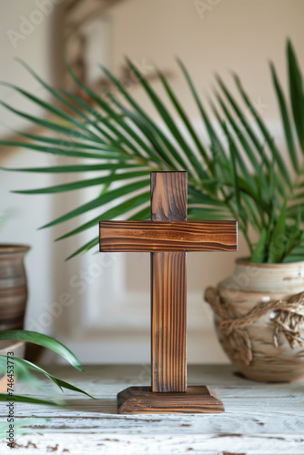 Christian wooden cross with palm branches