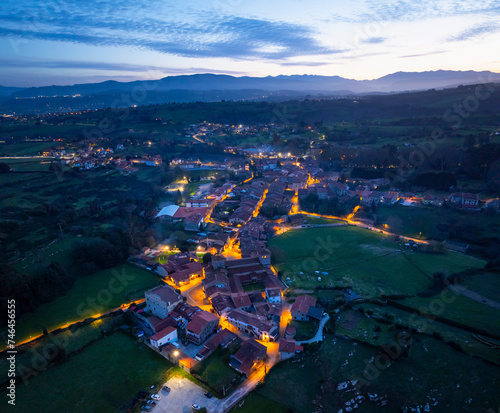 Winter landscape of the town of Santillana del Mar at dusk seen from a drone. Municipality of Santillana del Mar. Community of Cantabria. Spain. Europe