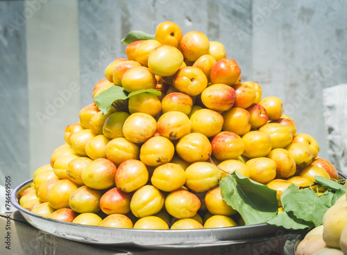 Juicy plums  peaches and apples at the Siab bazaar in the ancient city of Samarkand in Uzbekistan  nictarine at Siyob bozor