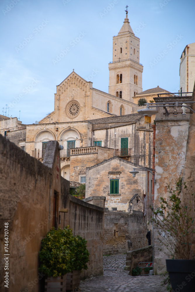 catheral of Maria Santissima della Bruna e Sant'Eustachio with narrow alley in Matera, Italy