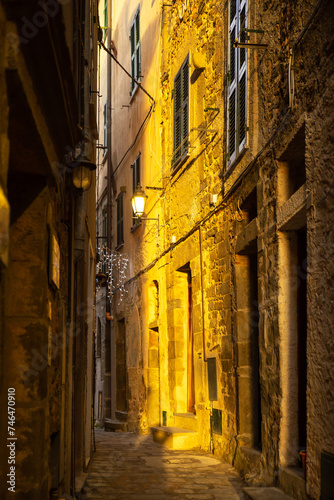 Golden sunshine pouring into the narrow alley in Vernazza  Cinque Terre  Italy