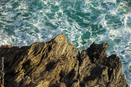 overlook of the sea rock and sea with foam, Cinque Terre, Italy