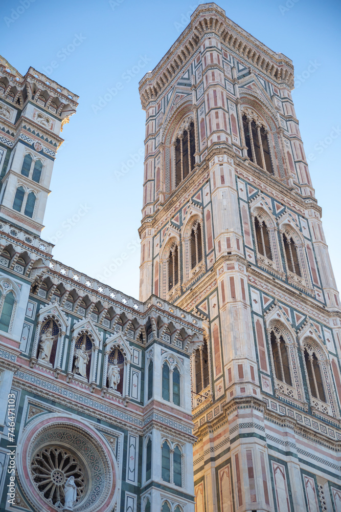 look up of the Cathedral of Santa Maria del Fiore and tower with blue sky, Florence, Italy