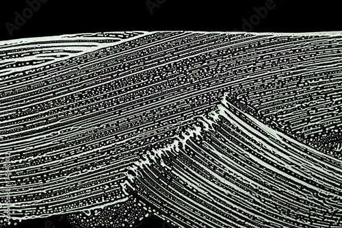 white soap foam wipe marks on black background, windows cleaning in spring