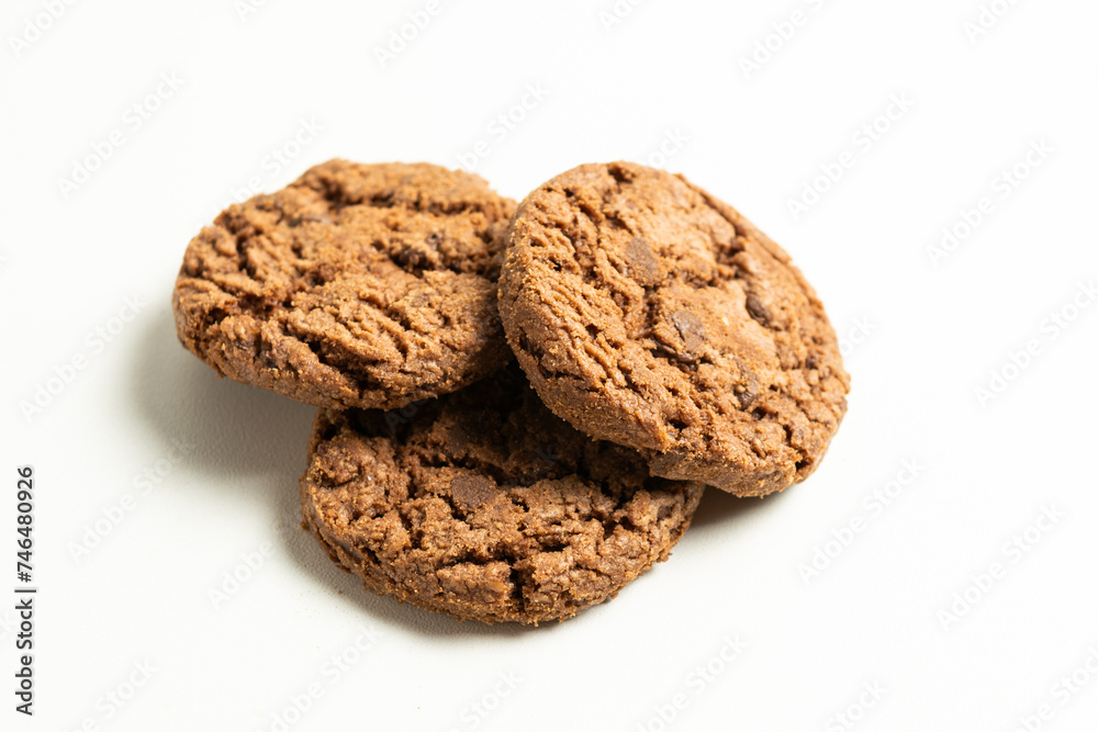 stack of dark chocolate cookies isolated on a white background stack of dark chocolate cookies isolated on a white background