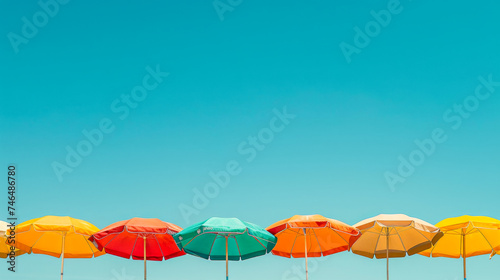 Beach Day Rainbow  Vibrant Sunshades Against Blue Sky