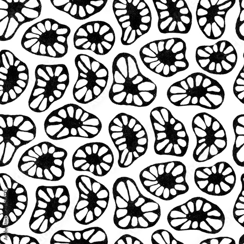 Black and white abstract lino cut seamless pattern design. Flowers, spots, cells
