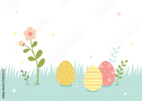 Easter eggs and flower branches on the grass background.
