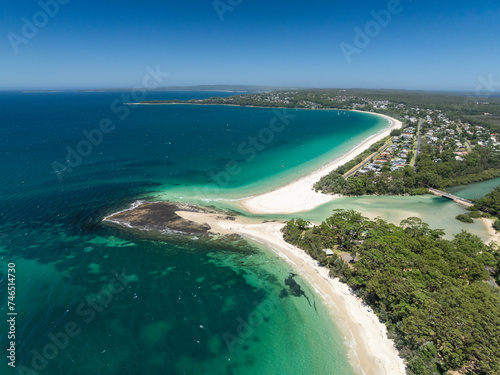 High angle aerial drone view of Huskisson Beach and Collingwood Beach in Huskisson and Vincentia, beachside suburbs in Jervis Bay Territory and on the South Coast of New South Wales, Australia.