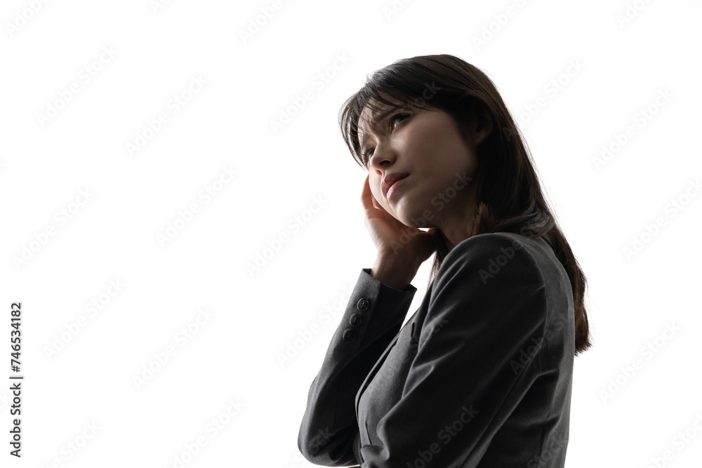 悩むスーツ姿の女性 悩むスーツ姿の女性