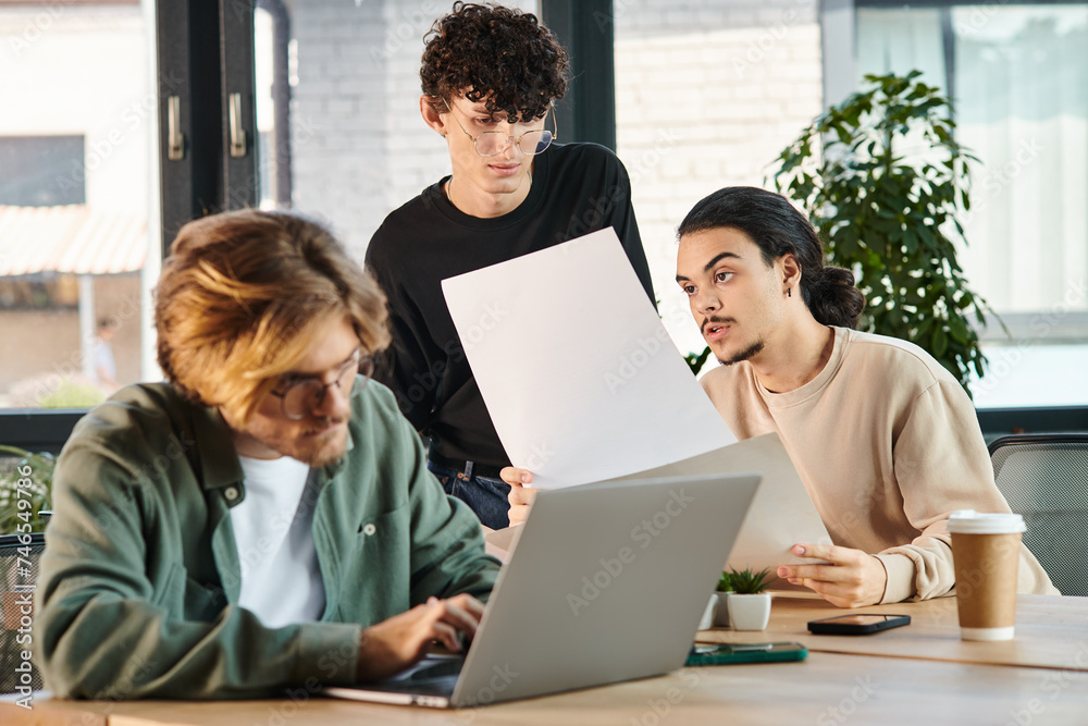 Team of young entrepreneurs in their 20s engaged in project planning in bright office, startup idea Team of young entrepreneurs in their 20s engaged in project planning in bright office, startup idea