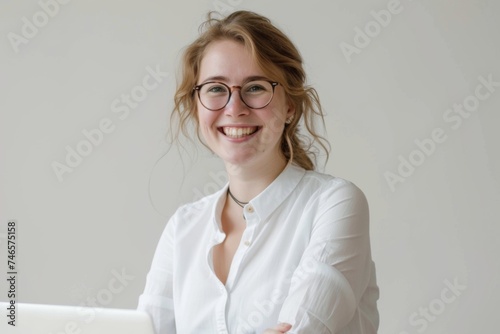 Smiling caucasian young businesswoman bank employee worker manager boss ceo looking at camera, using laptop for distant education work, e-learning, watching webinars online isolated in white 