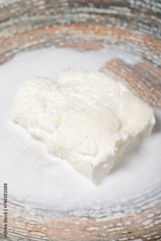 Buffalo cream. Dairy products. Fresh buffalo cream in a plate. Close up Buffalo cream. Dairy products. Fresh buffalo cream in a plate. Close up