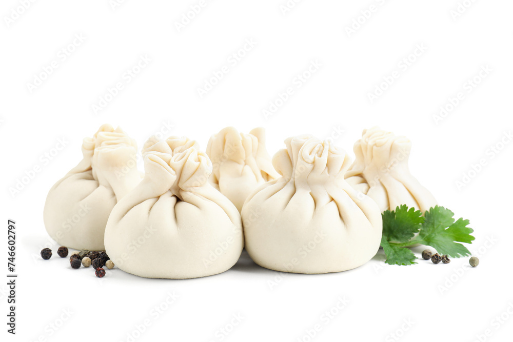 Uncooked khinkali (dumplings) and spices isolated on white. Georgian cuisine Uncooked khinkali (dumplings) and spices isolated on white. Georgian cuisine