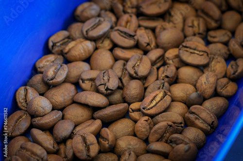 Coffee beans on the blue tray
