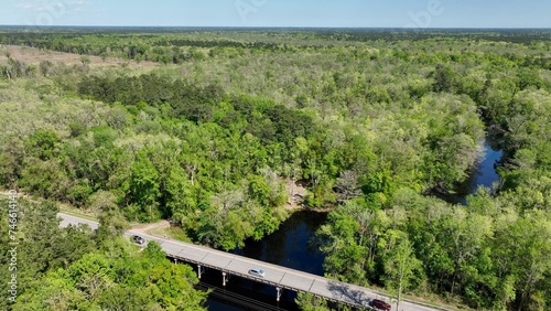 Wallpaper Mural Travel and transportation cars and trucks traveling on country road through green forest landscape in rural South Carolina Torontodigital.ca