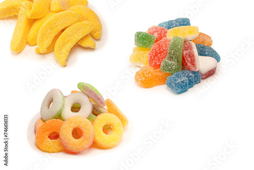 Assorted gummy candies isolated on a white background. Top view.