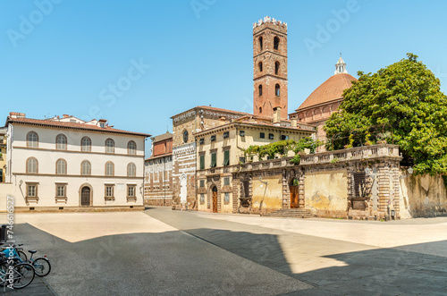 San Martino square with view of the bell tower of the Church of Saints Giovanni end Reparata, in the oldest part of the historic center of Lucca, Tuscany, Italy photo
