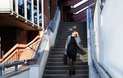 young happy businesswoman outdoor in sunny day