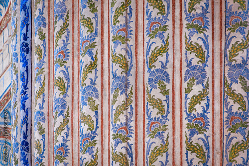 Ornate blue and red hand painted wall decoration motif Turkish floral Islamic patterns in a traditional Ottoman style in Istanbul, Turkey	 photo