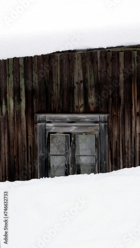 Lot of snow around an old, abandoned farm house in Southern Finland at the end of February. 