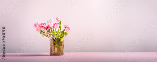 pink flower in vase with negative space