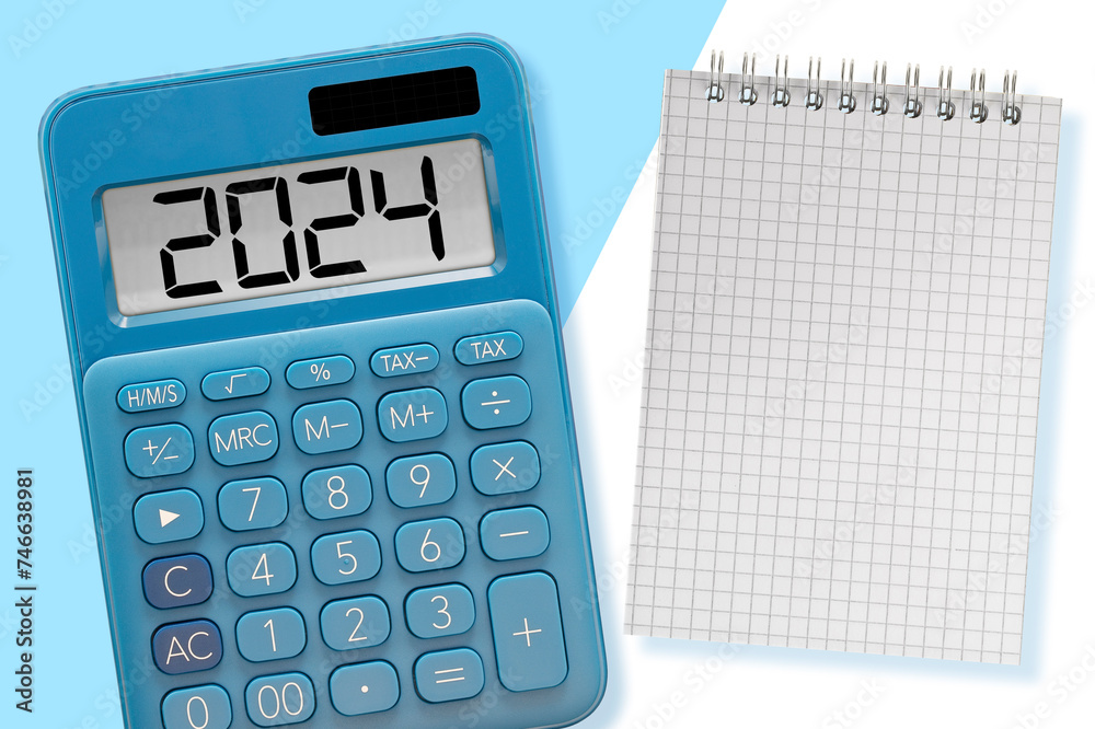 Budget 2024 concept with calculator, copyspace and notepad Budget 2024 concept with calculator, copyspace and notepad