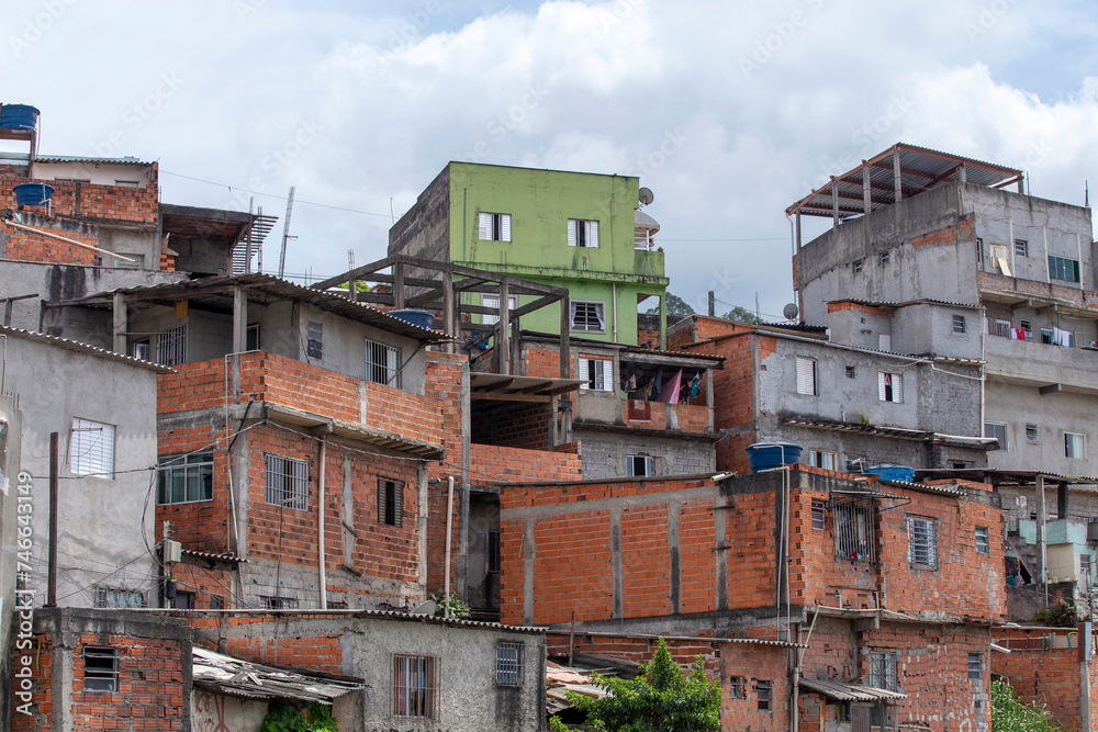 Shacks in a favela in the middle of the Atlantic Forest. Fragile buildings on the outskirts of São Paulo, Brazil.