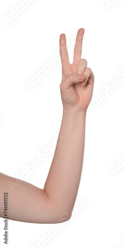 Playing rock, paper and scissors. Woman making scissors with her fingers on white background, closeup
