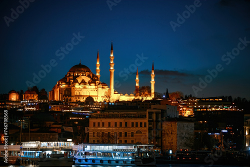 Istanbul skyline with Eminonu district and Suleymaniye at night photo