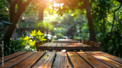 An unoccupied table in a tranquil garden café, offering a picturesque setting for product placement