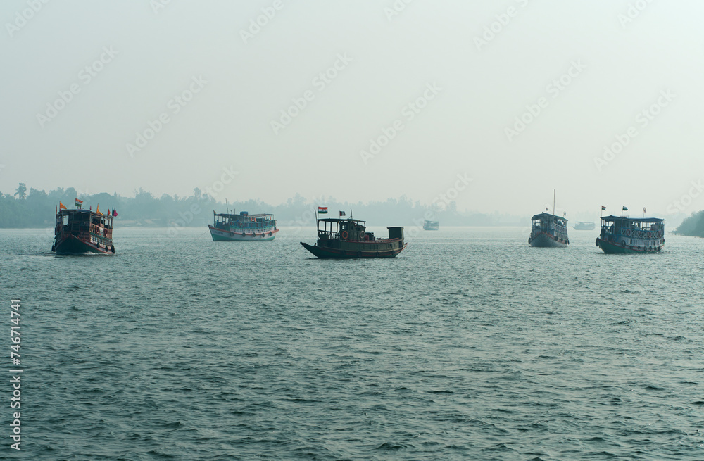 sundarbans west bengal india, enesco world heritage site, bay of bengal, traditional fishing boats, river estuaries, cruising through ripples, foggy winter morning, travel destination, eco tourism, fl