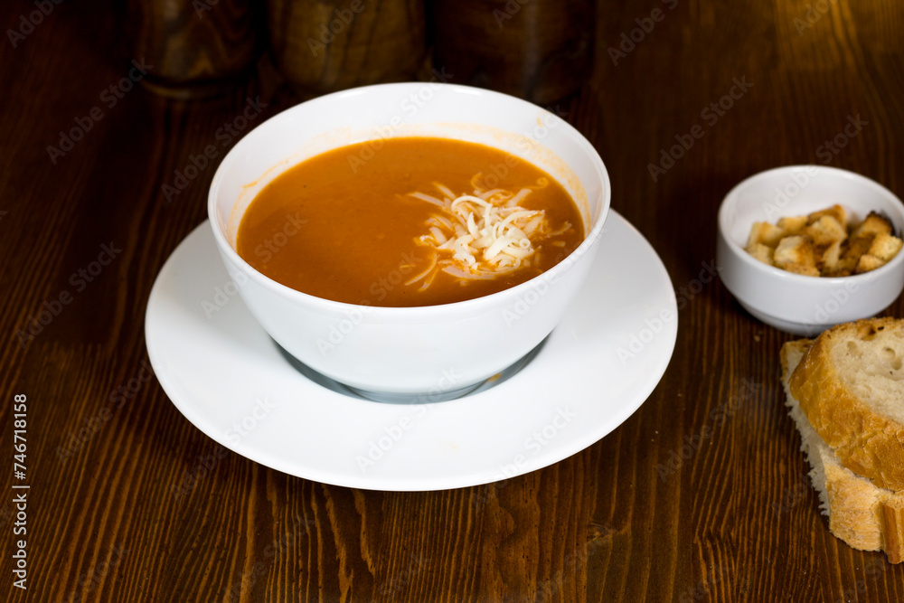 Tasty and creamy tomato soup made of fresh tomatoes Tasty and creamy tomato soup made of fresh tomatoes