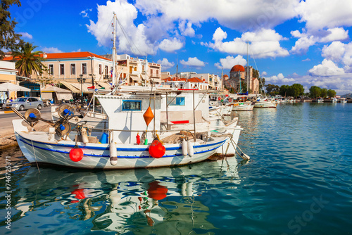 Fototapeta Naklejka Na Ścianę i Meble -  Saronics islands of Greece . Charming beautiful Greek island -Aegina with traditional fishing boats and St. Nicholas Church.