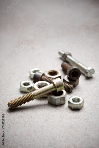 Nuts and bolts on a workbench © WINDCOLORS