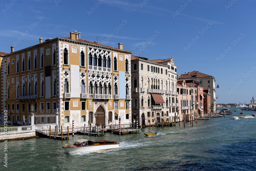 Grand Canal, historic decorative tenement houses, floating boats, Venice, Italy Grand Canal, historic decorative tenement houses, floating boats, Venice, Italy