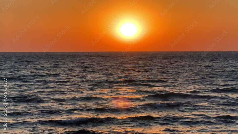 Panoramic view of the Black Sea coast at sunset. A picturesque view of the sunset sky in the evening. View of the golden sunset and waves on the sea near the Kiselyov rock. Tuapse 4K Panoramic view of the Black Sea coast at sunset. A picturesque view of the sunset sky in the evening. View of the golden sunset and waves on the sea near the Kiselyov rock. Tuapse 4K