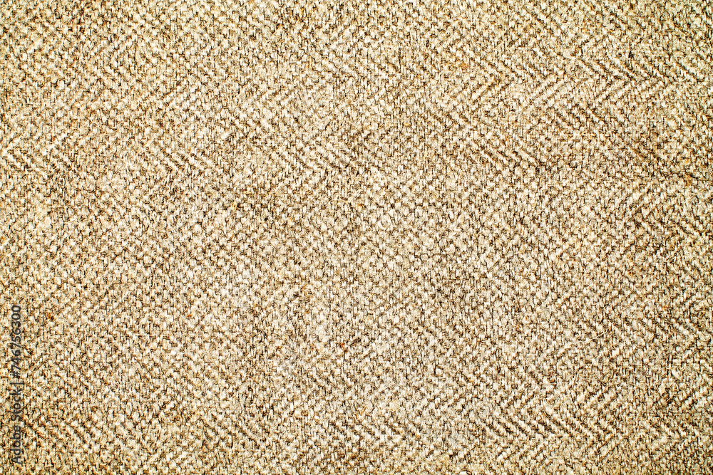 Fototapeta premium Close-up detail of fabric natural color Hemp material pattern design wallpaper. can be used as background or for graphic design. Natural linen material textile canvas Fabric texture background 