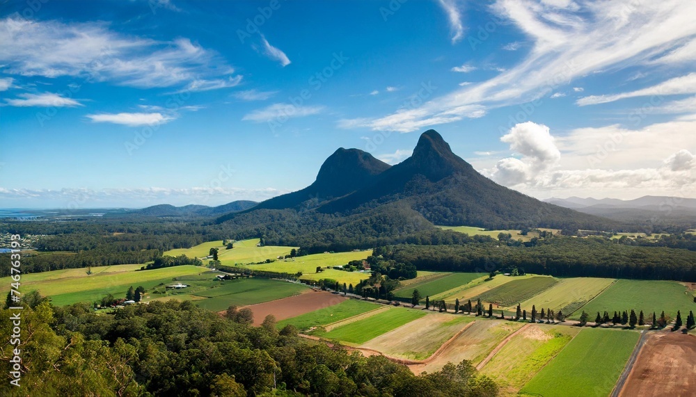 glass house mountains sunshine coast queensland australia showing blue sky mountains paddocks farming land and forests - obrazy, fototapety, plakaty 