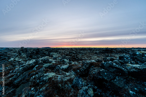 Solidified lava field at sunset photo