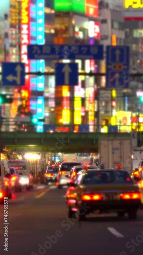 Shinjuku Kabuki-cho: Neon Lights and Streams of Cars