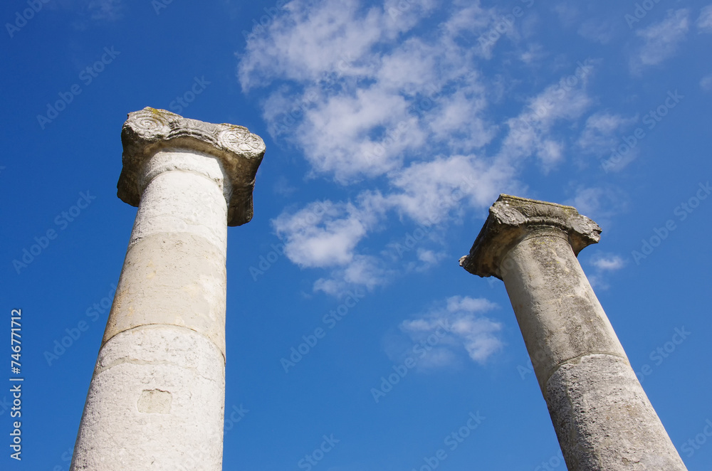 Altilia: Remnants of Roman-era columns stand out against the blue sky. Molise, Italy